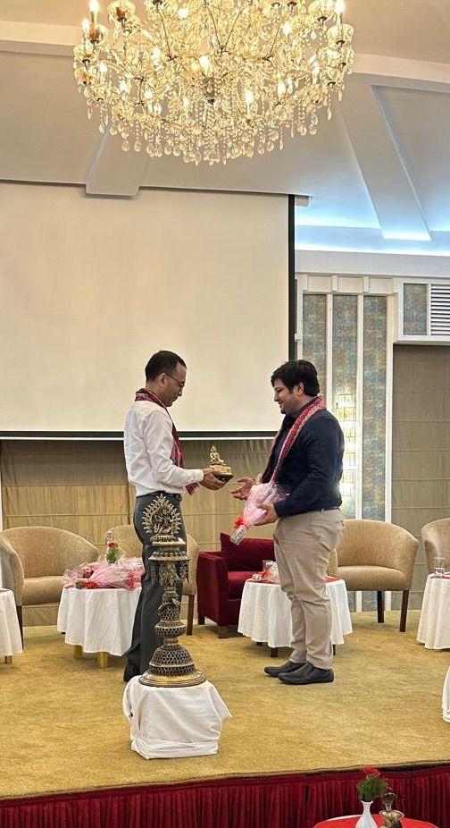 Dr. Samarth Ajay Thakkar receiving an award for academic excellence